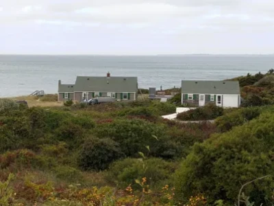 Antique waterfront cottages in a flood zone
